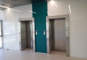 Облицовка стен в проекте Перегородки, двери, панели для административно-бытового здания Сибур АБК
