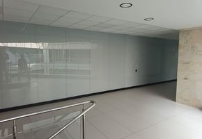 Облицовка стеклом в проекте Облицовка стеклянными панелями в офисе СПК